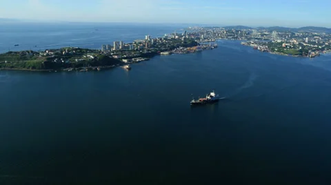 Aerial View. Flying over the seacoast. Harbor of the Vladivostok city. Stock Footage 34699587