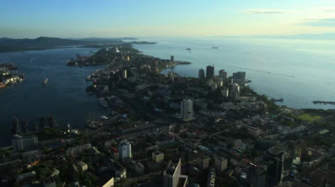 Aerial View. Flying over the seacoast. Harbor of the Vladivostok city. Stock Footage 34715484