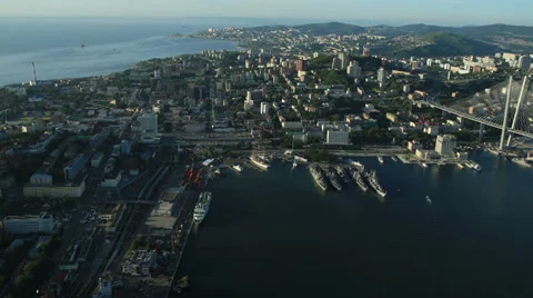 Aerial View. Flying over the seacoast. Harbor of the Vladivostok city. Stock Footage 34730113