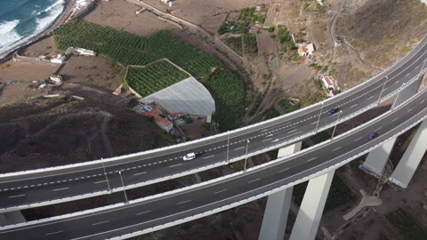 Aerial view flying over the Silva bridge with beautiful colors of the sunset Stock Footage 245656502