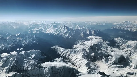 Aerial view flying over snowy Himalayas mountain tops Stock Footage