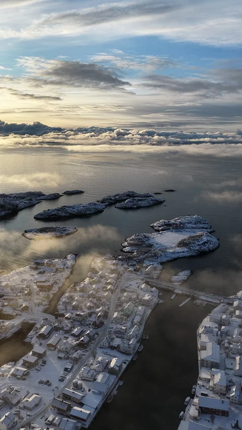 Aerial view flying over snowy Lofoten village, Norway Stock-Footage 345970477