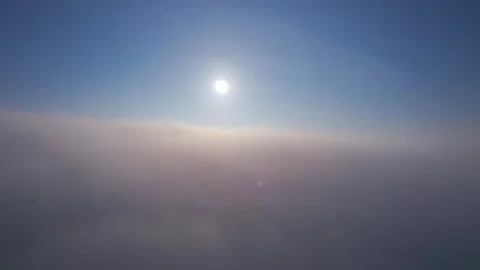 Aerial View of Flying Over Soft Clouds. Sky with Clouds and Sun. Meditation Stock Footage 276153203