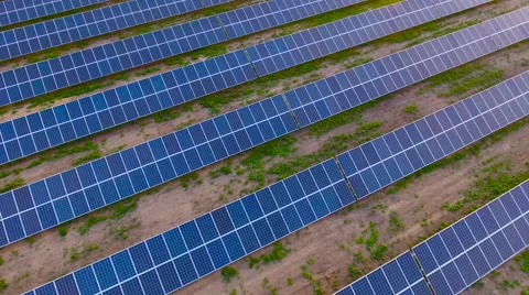Aerial View. Flying over the solar power plant with sun. Solar panels and sun. Stock Footage 65174645