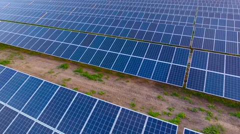 Aerial View. Flying over the solar power plant with sun. Solar panels and sun. Stock Footage 65174686