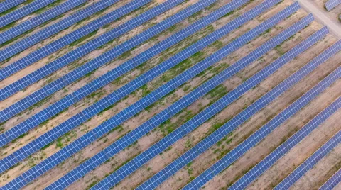Aerial View. Flying over the solar power plant with sun. Solar panels and sun. Stock Footage 65174866