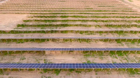 Aerial View. Flying over the solar power plant with sun. Solar panels and sun. Stock Footage 65174941