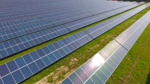 Aerial View. Flying over the solar power plant with sun. Solar panels and sun. Stock Footage 65175868
