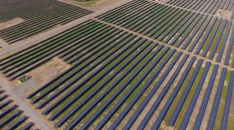 Aerial View. Flying over the solar power plant with sun. Solar panels and sun. Stock Footage 65238334