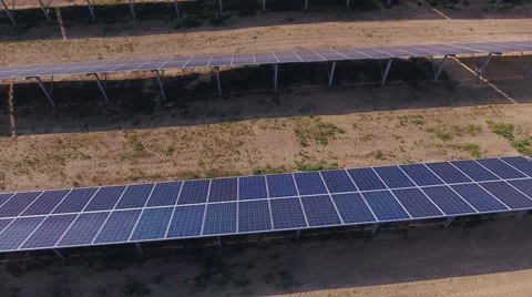 Aerial View. Flying over the solar power plant with sun. Solar panels and sun. Stock Footage 65238495