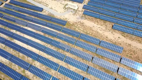 Aerial view flying over solar panel farm Stock Footage 337037663