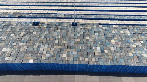 Aerial view flying over stacks of pallets 스톡 동영상 339304474