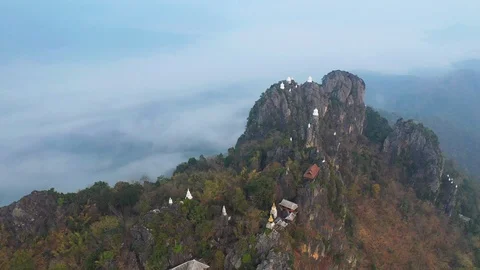 Aerial view of Flying over Temple on the cliff of top of Mounain, named Wat C Stock Footage 122515023
