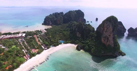Aerial view flying over Thai island towards beautiful green mountains and white Video stock 73179592