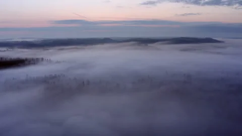 Aerial view flying over the thick morning mist. Stock Footage 241145216