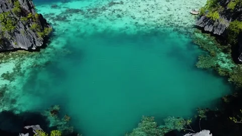 Aerial view flying over the twin lagoon in coron philippines Stock Footage 342576213