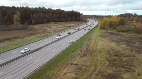 Aerial view flying parallel to a highway Stock-Footage 321524663