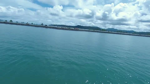 Aerial view flying at speed over the bay in the direction of cosway avenue. Stock Footage 166120193