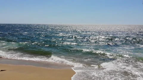 Aerial View Flying Through Beach Cave to Overlook Ocean Stock Footage 142303037