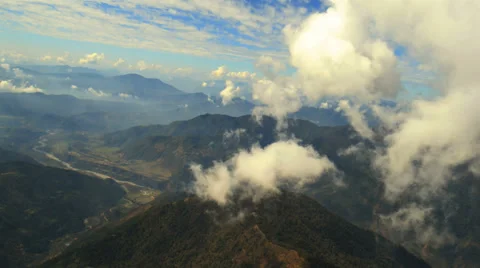 Aerial View: Flying through clouds over the mountains, Pokhara Valley, Nepal. Stock Footage 37564098