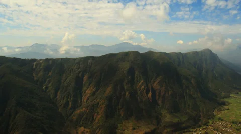 Aerial View: Flying through clouds over the mountains, Pokhara Valley, Nepal. Stock Footage 37626798