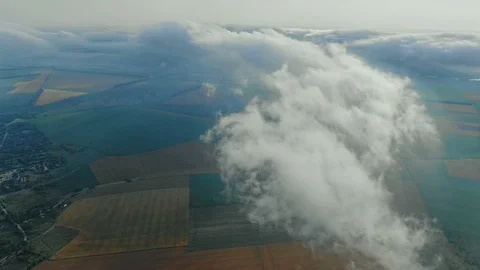 Aerial view, flying through the clouds above countryside scenery morning foggy 스톡 동영상 112866486