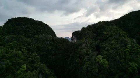 Aerial View Flying Through a Mountain Pass in Ao Nang, Krabi, Thailand Revealing Stock Footage 334723676