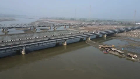 Aerial view of a flyover bridge over Ganges or Ganga River situated in Garh M Stock Footage 168482007