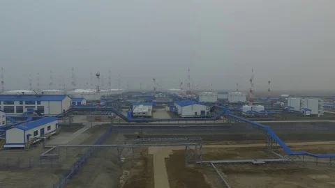 Aerial view fo oil pump station. Liquefied natural gas. Arctic village. Russia Stock Footage 76436228