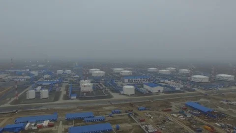 Aerial view fo oil pump station. Liquefied natural gas. Arctic village. Russia Stock Footage 76436293