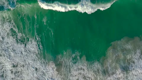 Aerial View Of Foamy Waves Rolling On Beach In Slow Motion Stock Footage 262336020