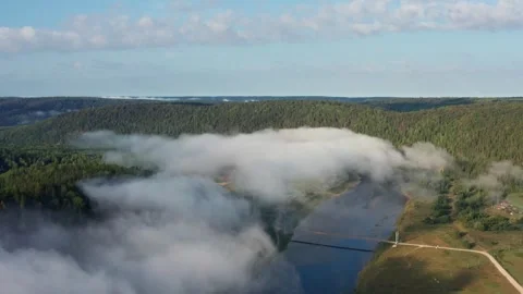 Aerial view of the forest and hills in the fog Stock Footage 252247244