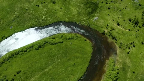 Aerial view on the forest and river. Beautiful natural landscape at the summer Stock Footage 134980925