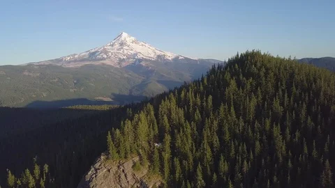 Aerial view, forest and volcano during beautiful sunny day Mount Hood Oregon USA Stock Footage 128945562