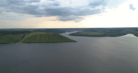 Aerial view of  a forest covered hillside  of the Dniester River. Bakota Ukraine Stock Footage 112980739