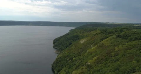 Aerial view of  a forest covered hillside  of the Dniester River. Bakota Ukraine Video stock 112980785