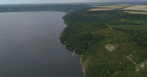 Aerial view of  a forest covered hillside  of the Dniester River. Bakota Ukraine Video stock 112981573
