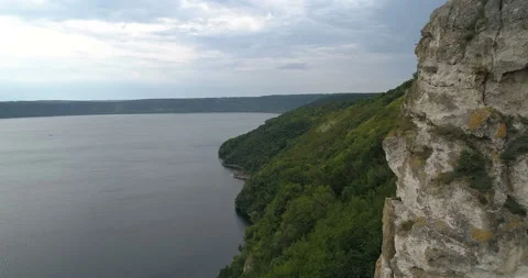 Aerial view of  a forest covered hillside  of the Dniester River. Bakota Ukraine Video stock 112989972