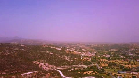 Aerial view of forest fields and hazy mountains in Cyprus. Video stock 188463708