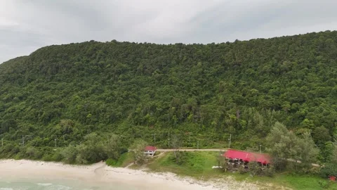 Aerial View of Forest Hillside, Red Roof Houses and Beach, Koh Rong Cambodia Stock-Footage 347316356