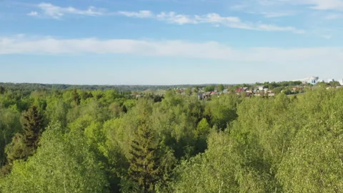 Aerial view of the forest in the middle climatic zone , roads and villages su Stock Footage 108421902