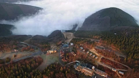 Aerial View of the Forest Mountain Ski Resort Above Clouds, Czech Republic Stock Footage 169591728