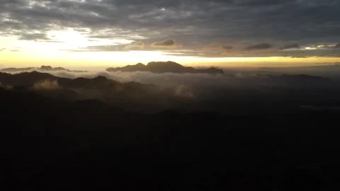Aerial view of forest mountains during sunrise Stock Footage 252703570