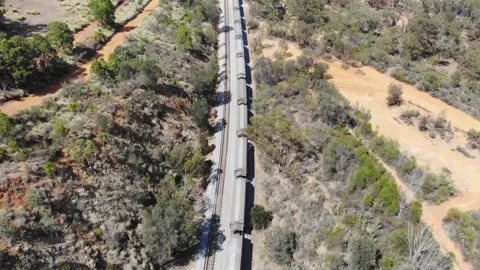 Aerial View of a Forest River Train Stock Footage 139552467