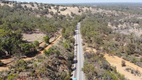 Aerial View of a Forest River Train Stock Footage 139619643