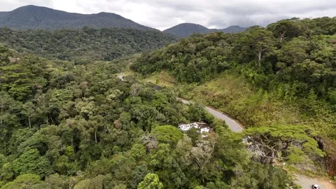 Aerial view of forest road and roadside waterfall at Khanh Le Pass 動画素材 337400417