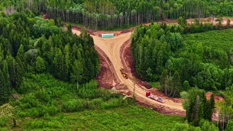 Aerial View Of Forest Road Construction Through Woodland Stock Footage 337267590