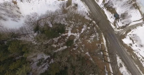 Aerial View, Forest road in winter Landscape Stock Footage 81113634