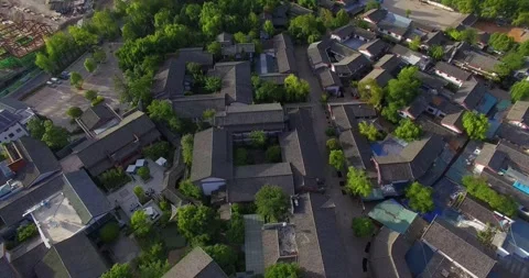 Aerial View of Forest-surrounded Ancient Buildings in Lijiang China Stock Footage 336880332