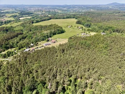 Aerial view of forested fields and farms Stock Photos